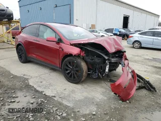 2023 Tesla Model X with VIN 7SAXCAE51PF390573, listed as a Copart auction lot 47499385 with Not Provided miles and Salvage Title. Bid and sale history available at DreamBid. Image 4.