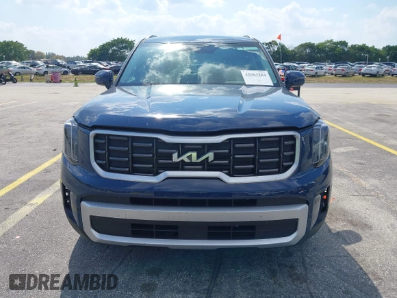 2025 Kia Telluride S with VIN 5XYP64GC0SG581646, listed as a IAAI auction lot 42063284 with 12,561 mi miles and . Bid and sale history available at DreamBid. Image 12.