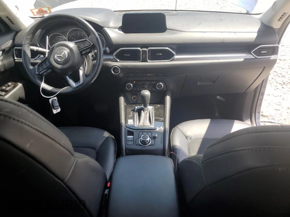 2018 Mazda CX-5 Touring with VIN JM3KFBCMXJ0460020, listed as a Copart auction lot 55997305 with 56,361 mi miles and Salvage Title. Bid and sale history available at DreamBid. Image 8.