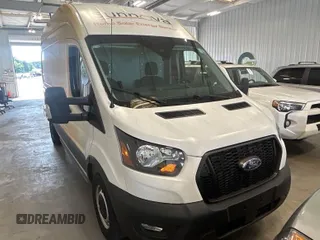 2023 Ford Transit Cargo z VIN 1FTBR1X85PKA75596, wystawiony jako IAAI lot #42742859 z przebiegiem 45 875 mil mil oraz . Historia ofert i sprzedaży dostępna na DreamBid. Obrazek 5.