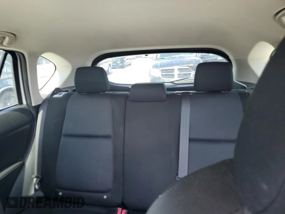 2015 Mazda CX-5 Sport z VIN JM3KE2BE6F0546994, wystawiony jako Copart lot #61948075 z przebiegiem 111 845 mil mil oraz Czysty tytuł • Clean title. Historia ofert i sprzedaży dostępna na DreamBid. Obrazek 10.
