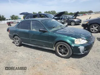 1999 Honda Civic VP z VIN 2HGEJ6618XH522162, wystawiony jako Copart lot #54427665 z przebiegiem 320 807 mil mil oraz Szkoda całkowita • Salvage title. Historia ofert i sprzedaży dostępna na DreamBid. Obrazek 4.