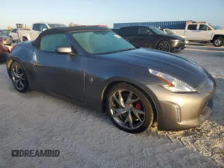 2014 Nissan 370Z Touring with VIN JN1AZ4FH4EM620092, listed as a Copart auction lot 77439254 with 38,662 mi miles and Salvage Title. Bid and sale history available at DreamBid. Image 4.