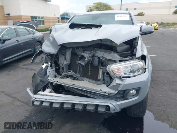 2021 Toyota Tacoma SR with VIN 3TMCZ5AN2MM405869, listed as a IAAI auction lot 42094533 with 78,449 mi miles and . Bid and sale history available at DreamBid. Image 13.