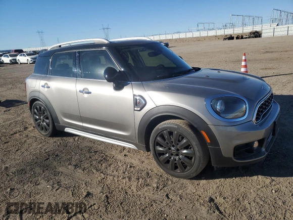 2019 MINI Countryman Cooper S with VIN WMZYT3C54K3E97691, listed as a Copart auction lot 88588295 with 55,560 mi miles and Salvage title. Bid and sale history available at DreamBid. Image 4.