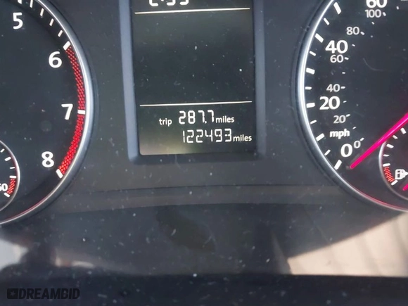 2014 Volkswagen Passat Wolfsburg Ed with VIN 1VWAT7A38EC051892, listed as a IAAI auction lot 41523058 with 122,493 mi miles. Bid and sale history available at carsss.com. Image 7.