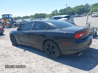 2013 Dodge Charger SE with VIN 2C3CDXBG5DH552376, listed as a IAAI auction lot 42039712 with 233,711 mi miles and . Bid and sale history available at DreamBid. Image 3.