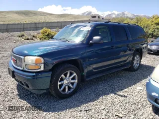 2005 GMC Yukon XL with VIN 1GKFK66U55J178218, listed as a Copart auction lot 54236465 with 246,303 mi miles and Salvage title. Bid and sale history available at DreamBid. Image 1.