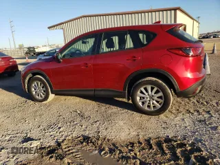 2016 Mazda CX-5 Sport with VIN JM3KE2BYXG0805613, listed as a Copart auction lot 86968884 with 114,524 mi miles and Clean Title. Bid and sale history available at carsss.com. Image 2.