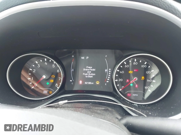 2020 Jeep Compass Latitude z VIN 3C4NJDBB9LT252474, wystawiony jako IAAI lot #42245000 z przebiegiem 62 186 mil mil oraz . Historia ofert i sprzedaży dostępna na DreamBid. Obrazek 7.
