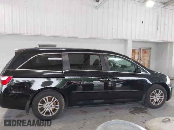 2013 Honda Odyssey EX-L с VIN 5FNRL5H68DB003918, выставлен на аукционе IAAI как лот 42233350 с пробегом 157 821 миль миль и . История ставок и продаж доступна на DreamBid. Изображение 13.