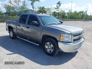 2013 Chevrolet Silverado 1500 LT with VIN 3GCPCSE01DG206827, listed as a IAAI auction lot 41976945 with 213,940 mi miles. Bid and sale history available at carsss.com. Image 1.