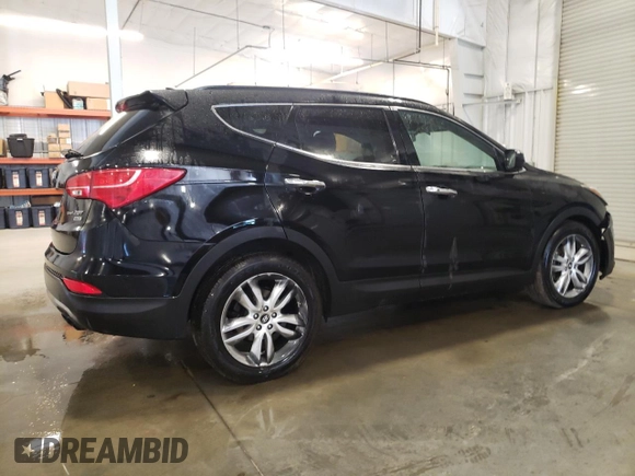 2013 Hyundai Santa Fe Sport z VIN 5XYZUDLA5DG076949, wystawiony jako Copart lot #55758515 z przebiegiem 168 636 mil mil oraz Szkoda całkowita • Salvage title. Historia ofert i sprzedaży dostępna na DreamBid. Obrazek 3.
