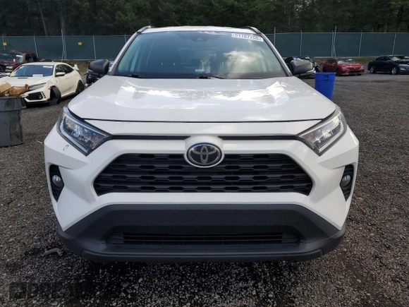 2020 Toyota RAV4 XLE with VIN 2T3P1RFV0LC099665, listed as a Copart auction lot 51187755 with 86,198 mi miles and Salvage Title. Bid and sale history available at DreamBid. Image 5.