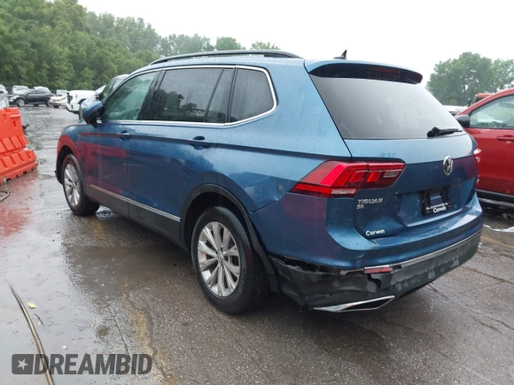 2018 Volkswagen Tiguan SEL with VIN 3VV2B7AX4JM019965, listed as a IAAI auction lot 42395783 with 107,822 mi miles and . Bid and sale history available at DreamBid. Image 3.