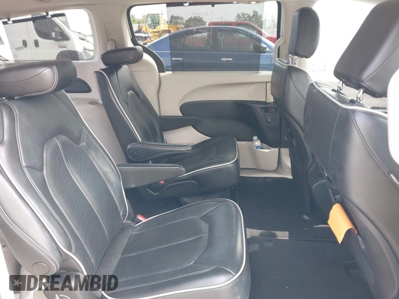 2023 Chrysler Pacifica Limited with VIN 2C4RC1GG7PR566163, listed as a IAAI auction lot 42393988 with 59,354 mi miles and . Bid and sale history available at DreamBid. Image 8.