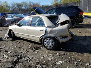2000 Mazda Protege DX z VIN JM1BJ2220Y0197585, wystawiony jako Copart lot #65309404 z przebiegiem Nie podano mil oraz Nie do naprawy • Non repairable. Historia ofert i sprzedaży dostępna na DreamBid. Obrazek 2.