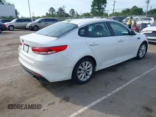 2016 Kia Optima LX with VIN 5XXGT4L34GG061718, listed as a IAAI auction lot 42176256 with 115,572 mi miles and . Bid and sale history available at carsss.com. Image 4.