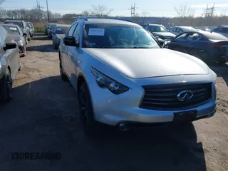2015 Infiniti QX70 with VIN JN8CS1MW6FM482894, listed as a IAAI auction lot 41671236 with 106,599 mi miles and . Bid and sale history available at DreamBid. Image 1.