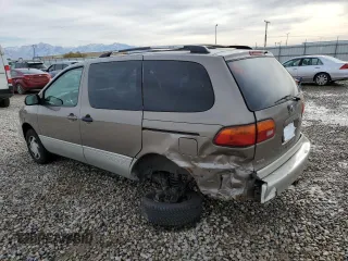 1999 Toyota Sienna LE with VIN 4T3ZF13C7XU133135, listed as a Copart auction lot 80618034 with 200,910 mi miles and Salvage Title. Bid and sale history available at carsss.com. Image 2.