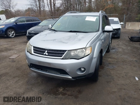 2009 Mitsubishi Outlander SE z VIN JA4MT31W89Z003101, wystawiony jako IAAI lot #41487678 z przebiegiem 90 226 mil mil oraz . Historia ofert i sprzedaży dostępna na DreamBid. Obrazek 6.