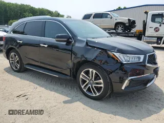 2017 Acura MDX Advance z VIN 5FRYD4H9XHB006658, wystawiony jako Copart lot #59113645 z przebiegiem 107 465 mil mil oraz Szkoda całkowita • Salvage title. Historia ofert i sprzedaży dostępna na DreamBid. Obrazek 4.