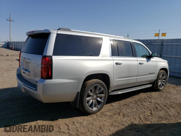 2017 Chevrolet Suburban Premier with VIN 1GNSKJKC4HR316953, listed as a Copart auction lot 76944884 with 105,753 mi miles and Salvage Title. Bid and sale history available at DreamBid. Image 3.