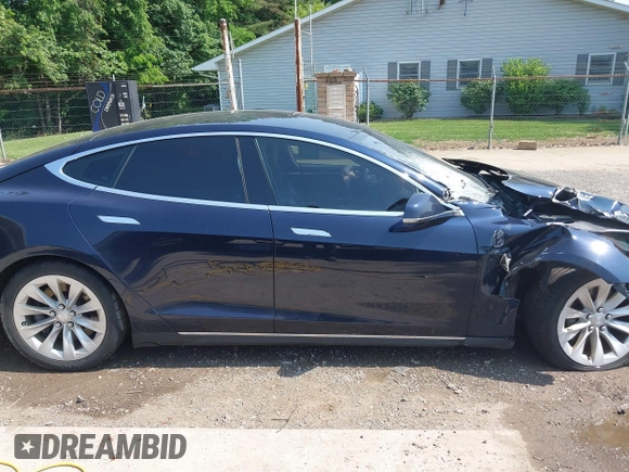 2014 Tesla Model S 60 with VIN 5YJSA1H17EFP65983, listed as a IAAI auction lot 42399288 with 166,365 mi miles and . Bid and sale history available at DreamBid. Image 14.