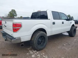 2013 Ford F-150 XL with VIN 1FTFW1EF8DKG07320, listed as a IAAI auction lot 41435996 with 141,425 mi miles. Bid and sale history available at carsss.com. Image 4.