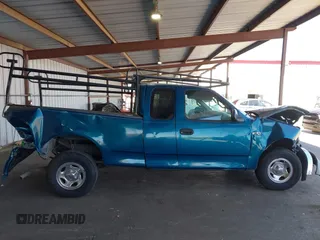 2001 Ford F-150 XL with VIN 1FTZX17281KF04799, listed as a IAAI auction lot 42550320 with Not provided miles and . Bid and sale history available at DreamBid. Image 12.