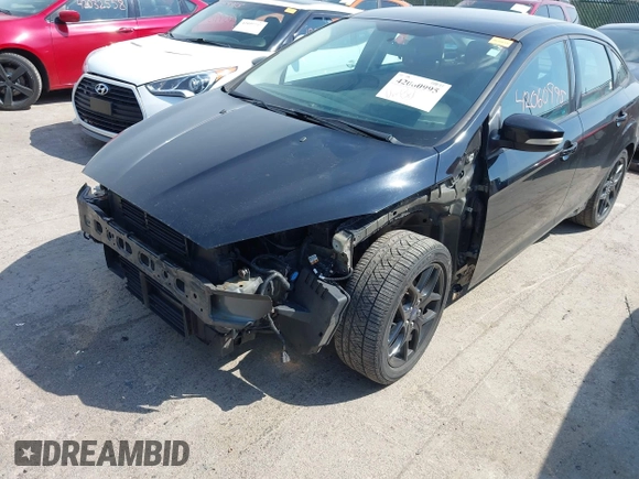 2016 Ford Focus SE with VIN 1FADP3FE6GL335943, listed as a IAAI auction lot 42060995 with 115,701 mi miles. Bid and sale history available at carsss.com. Image 6.