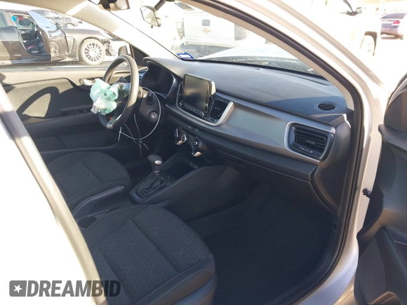 2023 Kia Rio LX with VIN 3KPA24AD9PE618894, listed as a IAAI auction lot 41771921 with 37,209 mi miles. Bid and sale history available at carsss.com. Image 5.