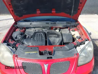 2009 Pontiac G5 with VIN 1G2AS18H097148690, listed as a IAAI auction lot 41801507 with 156,328 mi miles. Bid and sale history available at carsss.com. Image 10.