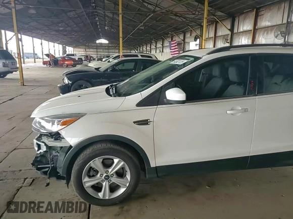 2015 Ford Escape SE with VIN 1FMCU9GX2FUB49175, listed as a Copart auction lot 54582125 with 90,544 mi miles and Salvage Title. Bid and sale history available at DreamBid. Image 14.