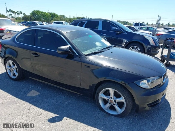 2011 BMW 1 Series 128i with VIN WBAUP7C55BVK78344, listed as a IAAI auction lot 41776367 with 138,351 mi miles. Bid and sale history available at carsss.com. Image 1.