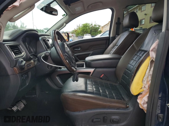 2017 Nissan Titan SL with VIN 1N6AA1E6XHN536129, listed as a Copart auction lot 60496415 with 132,269 mi miles and Salvage title. Bid and sale history available at DreamBid. Image 7.