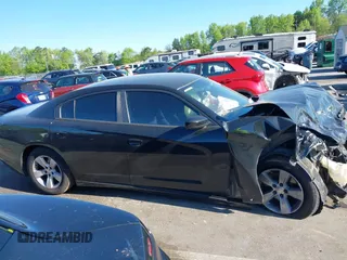 2012 Dodge Charger SE with VIN 2C3CDXBG7CH259867, listed as a IAAI auction lot 42046084 with 240,558 mi miles and . Bid and sale history available at DreamBid. Image 12.