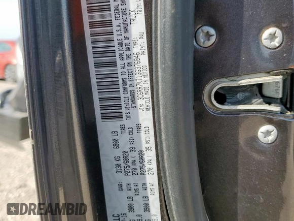 2016 Ram 1500 Tradesman z VIN 3C6RR7KT1GG376846, wystawiony jako Copart lot #57283185 z przebiegiem 214 594 mil mil oraz Szkoda całkowita • Salvage title. Historia ofert i sprzedaży dostępna na DreamBid. Obrazek 12.