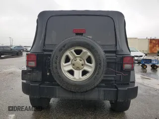 2009 Jeep Wrangler Unlimited X with VIN 1J4GA39119L755818, listed as a Copart auction lot 47886245 with 187,972 mi miles and Salvage Title. Bid and sale history available at carsss.com. Image 6.