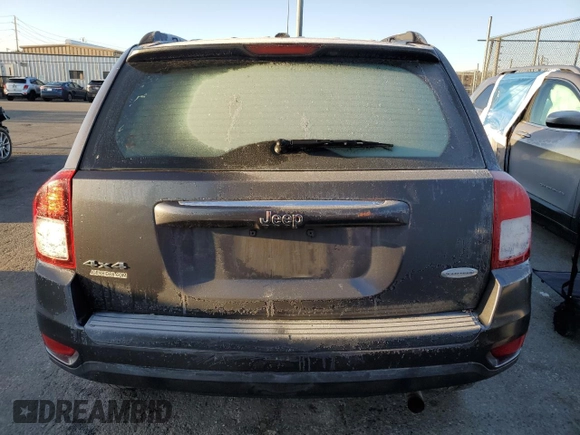 2016 Jeep Compass Latitude with VIN 1C4NJDEB0GD542254, listed as a Copart auction lot 49496545 with 153,203 mi miles and Salvage Title. Bid and sale history available at carsss.com. Image 6.
