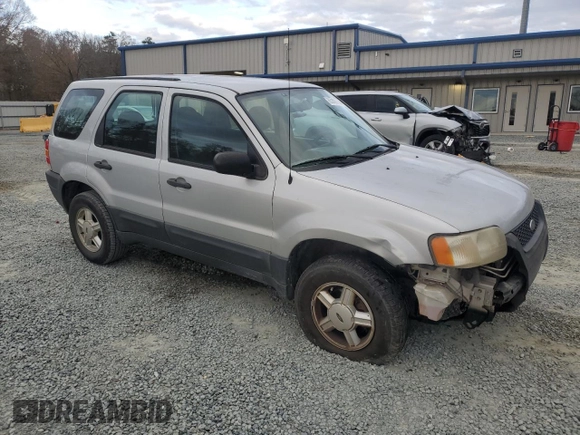 2004 Ford Escape with VIN 1FMCU02144KB63439, listed as a Copart auction lot 85310514 with 275,625 mi miles and Salvage title. Bid and sale history available at DreamBid. Image 4.
