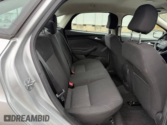 2017 Ford Focus SE with VIN 1FADP3F28HL28437, listed as a Copart auction lot 57904285 with 72,966 mi miles and Clean title. Bid and sale history available at DreamBid. Image 6.