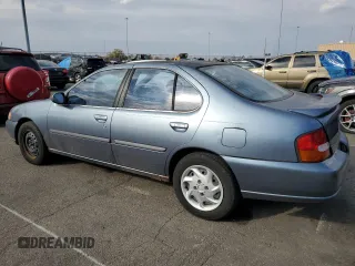 1999 Nissan Altima XE with VIN 1N4DL01D7XC222527, listed as a Copart auction lot 77155224 with 140,082 mi miles and Salvage Title. Bid and sale history available at carsss.com. Image 2.