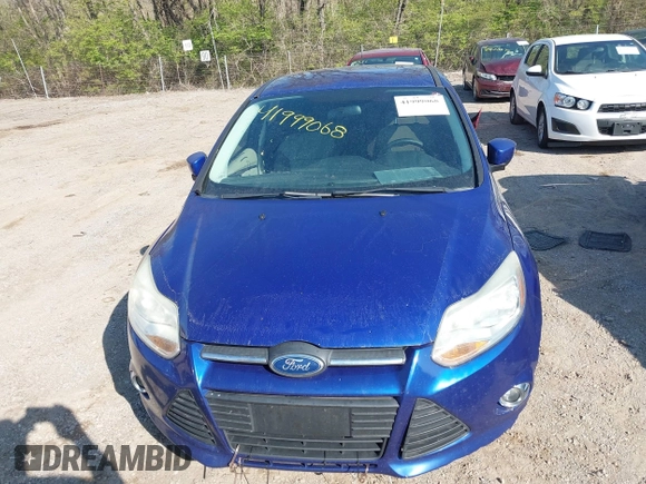 2012 Ford Focus SE z VIN 1FAHP3K28CL297610, wystawiony jako IAAI lot #41999068 z przebiegiem 164 482 mil mil oraz . Historia ofert i sprzedaży dostępna na DreamBid. Obrazek 12.