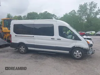 2020 Ford Transit Passenger XL z VIN 1FBAX2CG9LKA95093, wystawiony jako IAAI lot #42292375 z przebiegiem 53 912 mil mil oraz . Historia ofert i sprzedaży dostępna na DreamBid. Obrazek 14.