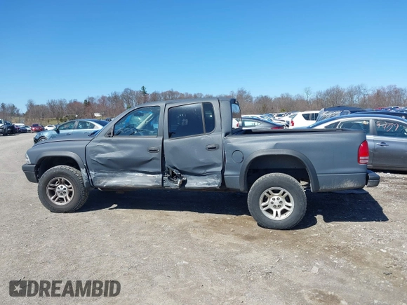 2004 Dodge Dakota Sport with VIN 1D7HG38K84S608161, listed as a IAAI auction lot 41863394 with 145,288 mi miles and . Bid and sale history available at DreamBid. Image 14.