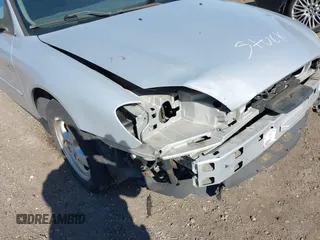 2006 Ford Taurus SE with VIN 1FAFP53U66A206014, listed as a IAAI auction lot 42045047 with 65,326 mi miles. Bid and sale history available at carsss.com. Image 12.