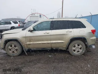 2011 Jeep Grand Cherokee Laredo with VIN 1J4RR4GG9BC563065, listed as a IAAI auction lot 41798136 with 192,149 mi miles. Bid and sale history available at carsss.com. Image 14.