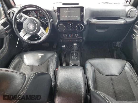 2016 Jeep Wrangler Unlimited Sport z VIN 1C4BJWDG5GL179046, wystawiony jako Copart lot #52989725 z przebiegiem 129 051 mil mil oraz Szkoda całkowita • Salvage title. Historia ofert i sprzedaży dostępna na DreamBid. Obrazek 8.