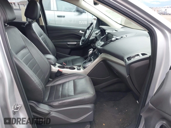 2013 Ford Escape SEL with VIN 1FMCU9H93DUD70670, listed as a IAAI auction lot 41867784 with 207,956 mi miles. Bid and sale history available at carsss.com. Image 5.